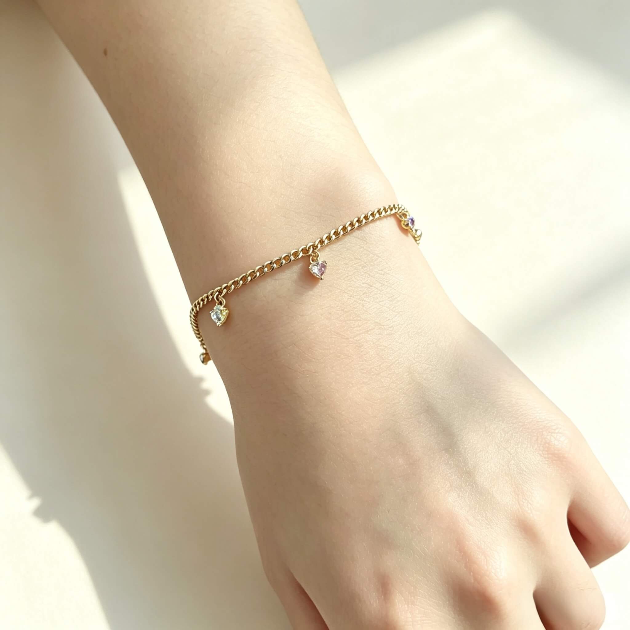 Model wearing a delicate S925 silver cubic zirconia bracelet