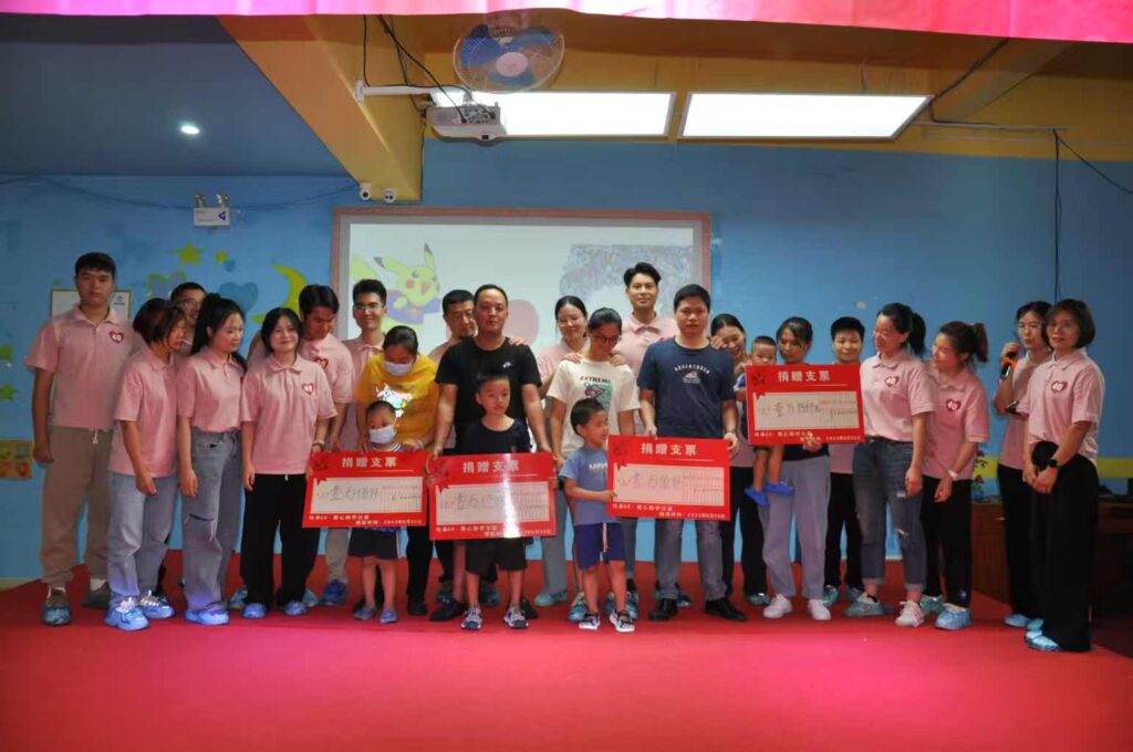 Custom jewelry factory team participating in charity public‑welfare activity
